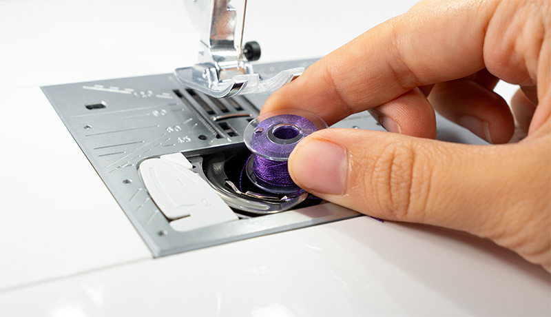 Janome Continental M8 Drop-in bobbin with thread sensor